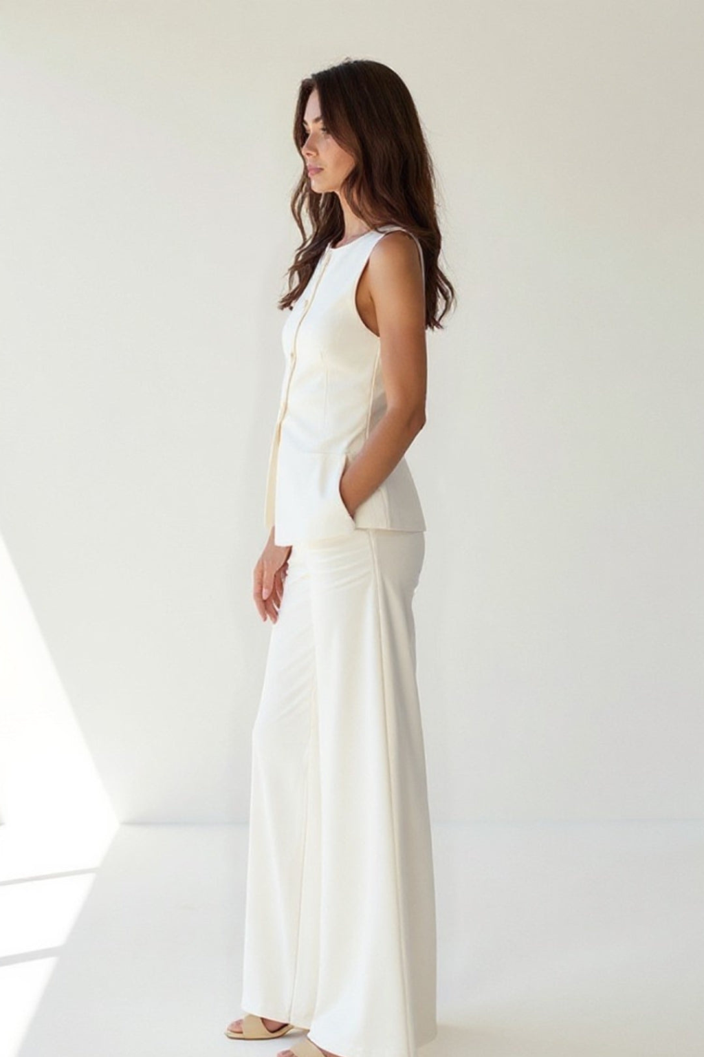 Refined Sleeveless Two-Piece Set – Tailored Button Top & Wide-Leg Pants