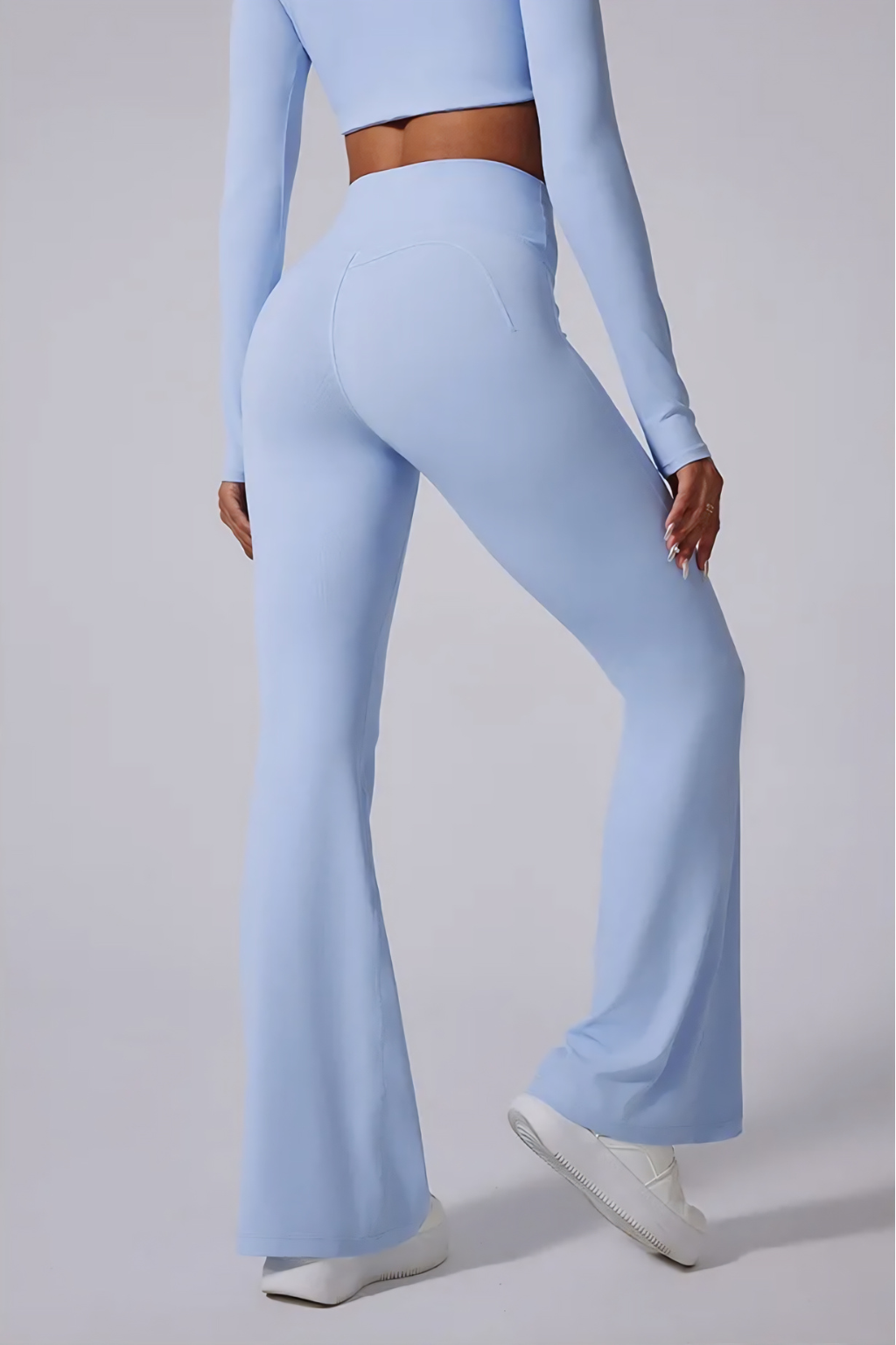 Sleek Flared Pants Two-Piece Set – Long-Sleeve Crop Top & High-Waist Fit