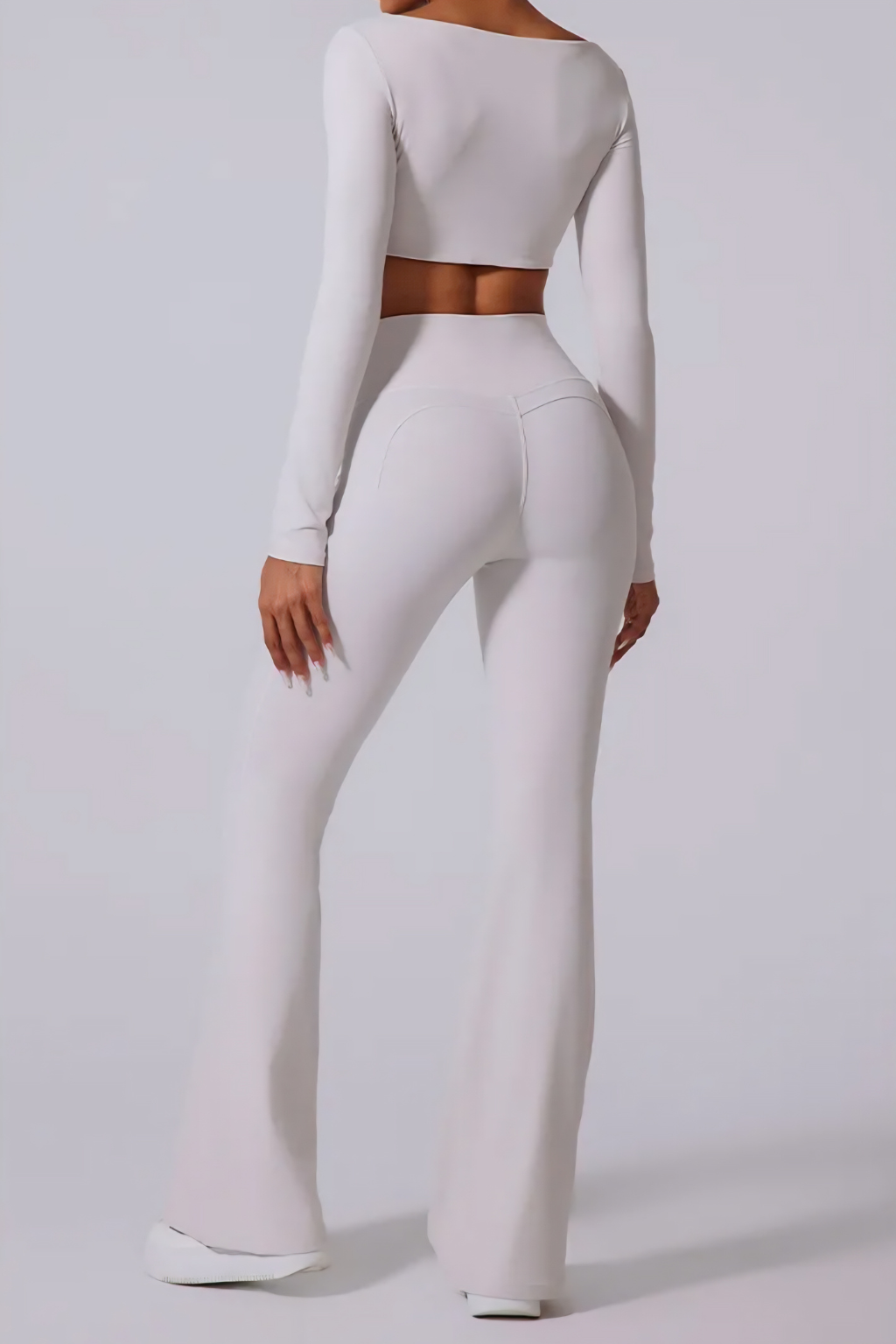 Sleek Flared Pants Two-Piece Set – Long-Sleeve Crop Top & High-Waist Fit
