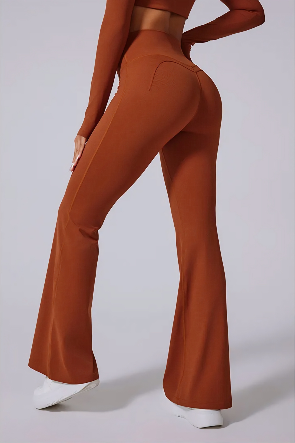 Sleek Flared Pants Two-Piece Set – Long-Sleeve Crop Top & High-Waist Fit