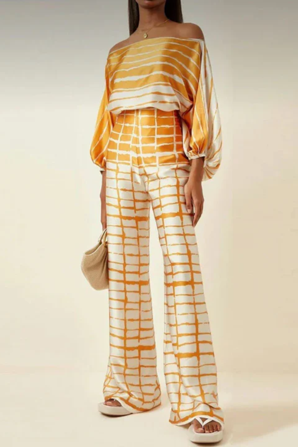 Graceful Off-Shoulder Wide-Leg Jumpsuit – Abstract Print Summer Style