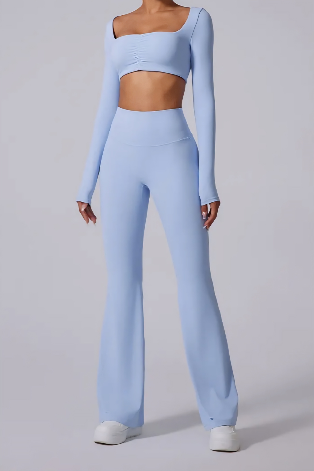 Sleek Flared Pants Two-Piece Set – Long-Sleeve Crop Top & High-Waist Fit